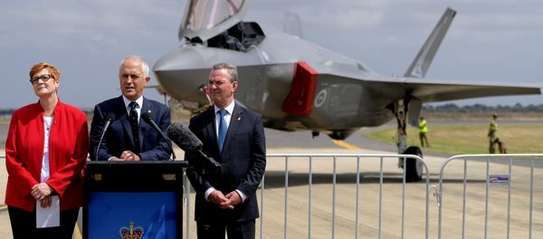 Australian Prime Minister Malcolm Turnbull speaks next to Minister for Defence, Senator Marise Payne and Minister for Defence Industry, Christopher Payne. - Sputnik International