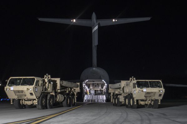  In this photo provided by U.S. Forces Korea, trucks carrying U.S. missile launchers and other equipment needed to set up the Terminal High Altitude Area Defense (THAAD) missile defense system arrive at the Osan air base in Pyeongtaek, South Korea, Monday, March 6, 2017. - Sputnik International