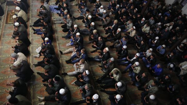 Crimean Tatars pray in a mosque marking the Eid al-Adha, celebrated by Muslims worldwide, in Bakhchisarai, Crimea. (File) - Sputnik International