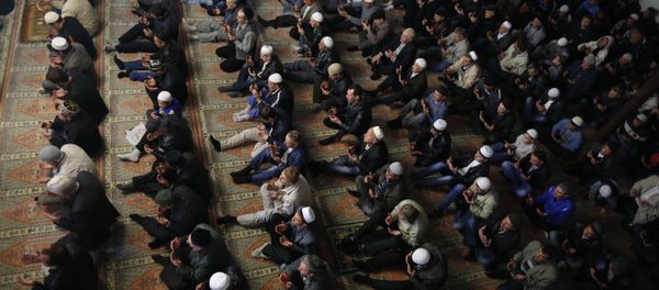 Crimean Tatars pray in a mosque marking the Eid al-Adha, celebrated by Muslims worldwide, in Bakhchisarai, Crimea. (File) Crimean Tatars pray in a mosque marking the Eid al-Adha, celebrated by Muslims worldwide, in Bakhchisarai, Crimea. (File) - Sputnik International