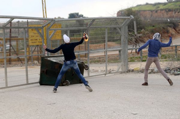 A Palestinian protester hurls a molotov cocktail towards Israeli troops during clashes near Israel's Ofer Prison near the West Bank city of Ramallah, March 7, 2017 A Palestinian protester hurls a molotov cocktail towards Israeli troops during clashes near Israel's Ofer Prison near the West Bank city of Ramallah, March 7, 2017 - Sputnik International