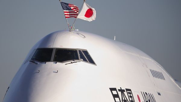 The flags of the United States and Japan are flown atop the plane carrying Japanese Prime Minister Shinzo Abe, as it arrives at Andrews Air Force Base, Md., Thursday, Feb. 21, 2013 The flags of the United States and Japan are flown atop the plane carrying Japanese Prime Minister Shinzo Abe, as it arrives at Andrews Air Force Base, Md., Thursday, Feb. 21, 2013 - Sputnik International
