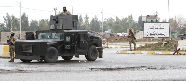 Masked Kurdish forces, loyal to the Patriotic Union of Kurdistan (PUK) party, stand guard at the North Oil Company headquarters in the northern Kurdish-controlled city of Kirkuk on March 2, 2017 Masked Kurdish forces, loyal to the Patriotic Union of Kurdistan (PUK) party, stand guard at the North Oil Company headquarters in the northern Kurdish-controlled city of Kirkuk on March 2, 2017 - Sputnik International