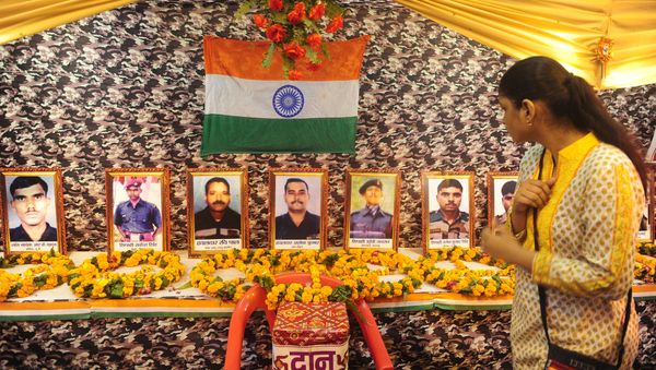 Indian people pay tribute to 18 martyred Indian soldiers, who were killed in a militant attack in Uri near the Line of Control (LoC) on 18 September, at a Durga Puja Panda Shastri Nagar in Allahabad on October 9, 2016 Indian people pay tribute to 18 martyred Indian soldiers, who were killed in a militant attack in Uri near the Line of Control (LoC) on 18 September, at a Durga Puja Panda Shastri Nagar in Allahabad on October 9, 2016 - Sputnik International