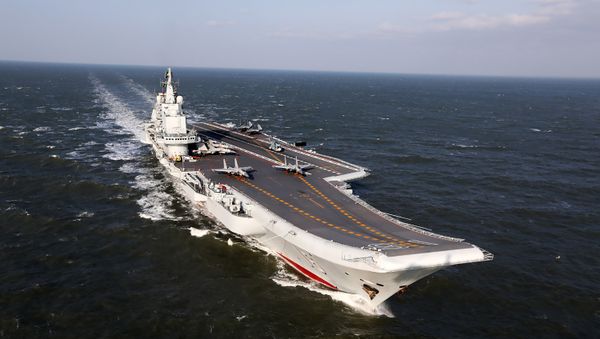 December 24, 2016 shows the Liaoning, China's only aircraft carrier, sailing during military drills in the Pacific - Sputnik International