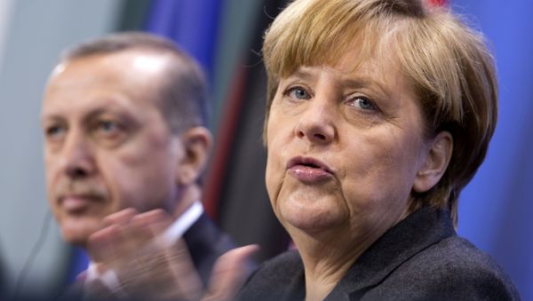 German Chancellor Angela Merkel, right, and Turkey's Prime Minister Recep Tayyip Erdogan, left (AP Photo/Axel Schmidt) German Chancellor Angela Merkel, right, and Turkey's Prime Minister Recep Tayyip Erdogan, left (AP Photo/Axel Schmidt) - Sputnik International