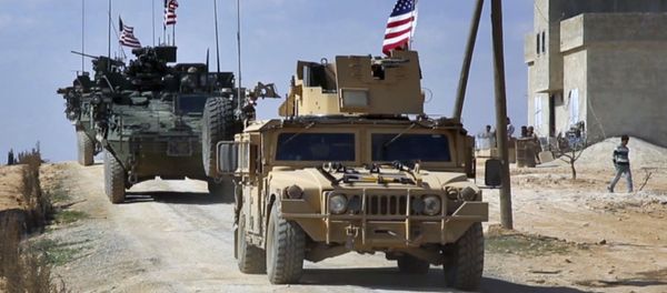 This Tuesday, March 7, 2017 frame grab from video provided by Arab 24 network, shows U.S. forces patrol on the outskirts of the Syrian town, Manbij, a flashpoint between Turkish troops and allied Syrian fighters and U.S.-backed Kurdish fighters, in al-Asaliyah village, Aleppo province, Syria This Tuesday, March 7, 2017 frame grab from video provided by Arab 24 network, shows U.S. forces patrol on the outskirts of the Syrian town, Manbij, a flashpoint between Turkish troops and allied Syrian fighters and U.S.-backed Kurdish fighters, in al-Asaliyah village, Aleppo province, Syria - Sputnik International