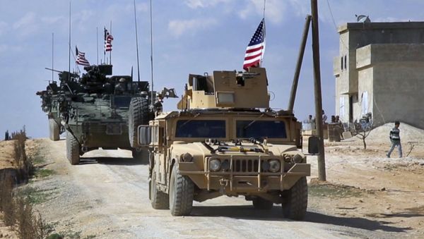 This Tuesday, March 7, 2017 frame grab from video provided by Arab 24 network, shows U.S. forces patrol on the outskirts of the Syrian town, Manbij, a flashpoint between Turkish troops and allied Syrian fighters and U.S.-backed Kurdish fighters, in al-Asaliyah village, Aleppo province, Syria This Tuesday, March 7, 2017 frame grab from video provided by Arab 24 network, shows U.S. forces patrol on the outskirts of the Syrian town, Manbij, a flashpoint between Turkish troops and allied Syrian fighters and U.S.-backed Kurdish fighters, in al-Asaliyah village, Aleppo province, Syria - Sputnik International