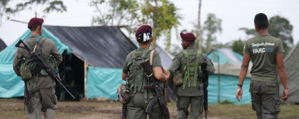 Revolutionary Armed Forces of Colombia, FARC, rebels walk in their camp in La Carmelita near Puerto Asis in Colombia's southwestern state of Putumayo, Tuesday, Feb. 28, 2017 Revolutionary Armed Forces of Colombia, FARC, rebels walk in their camp in La Carmelita near Puerto Asis in Colombia's southwestern state of Putumayo, Tuesday, Feb. 28, 2017 - Sputnik International