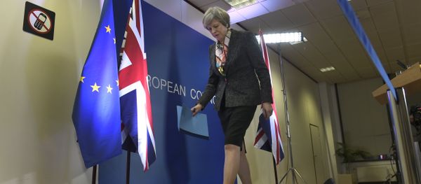 British Prime Minister Theresa May leaves after a press conference during a European Summit at the EU headquarters in Brussels on March 9, 2017 British Prime Minister Theresa May leaves after a press conference during a European Summit at the EU headquarters in Brussels on March 9, 2017 - Sputnik International