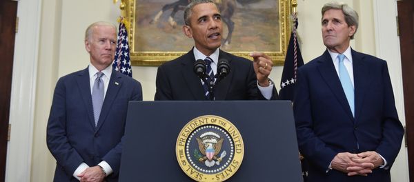 US President Barack Obama speaks on the Keystone XL pipeline, flanked by Secretary of State John Kerry (R), and Vice President Joe Biden, on November 6, 2015 in the Roosevelt Room of the White House in Washington, DC. US President Barack Obama speaks on the Keystone XL pipeline, flanked by Secretary of State John Kerry (R), and Vice President Joe Biden, on November 6, 2015 in the Roosevelt Room of the White House in Washington, DC. - Sputnik International