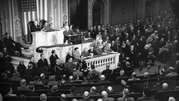 U.S. President Harry S. Truman, standing at podium, addresses a joint session of Congress in the House Chamber in Washington, D.C., March 12, 1947. - Sputnik International