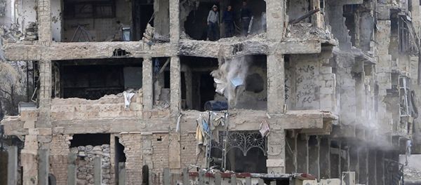 Damaged building in Aleppo Damaged building in Aleppo - Sputnik International