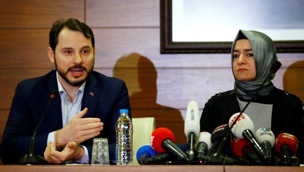 Turkey's Energy Minister Berat Albayrak, accompanied by Family and Social Affairs Minister Fatma Betul Sayan Kaya, speaks during a news conference at Ataturk International airport in Istanbul, Turkey Turkey's Energy Minister Berat Albayrak, accompanied by Family and Social Affairs Minister Fatma Betul Sayan Kaya, speaks during a news conference at Ataturk International airport in Istanbul, Turkey - Sputnik International