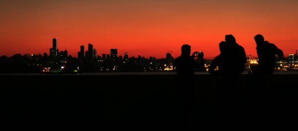 Syrian refugees take a pictures as they gather on the shores of the town of Dbayeh north of Beirut as the sun sets over the Lebanese capital on February 5, 2017. - Sputnik International