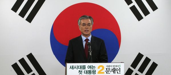 Opposition Democratic United Party's presidential candidate Moon Jae-in speaks in front of a national flag during a press conference at the party's headquarters in Seoul, South Korea. (File) Opposition Democratic United Party's presidential candidate Moon Jae-in speaks in front of a national flag during a press conference at the party's headquarters in Seoul, South Korea. (File) - Sputnik International