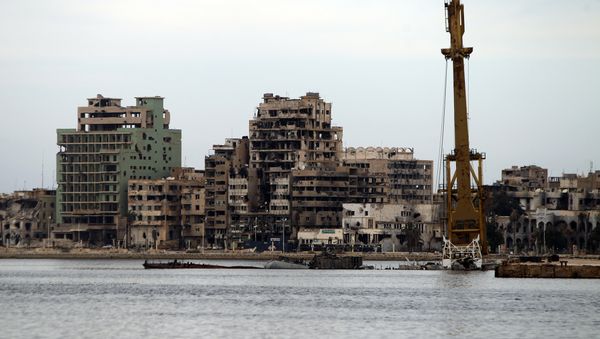 A general view shows destroyed buildings in Libya's eastern coastal city of Benghazi (file) A general view shows destroyed buildings in Libya's eastern coastal city of Benghazi (file) - Sputnik International