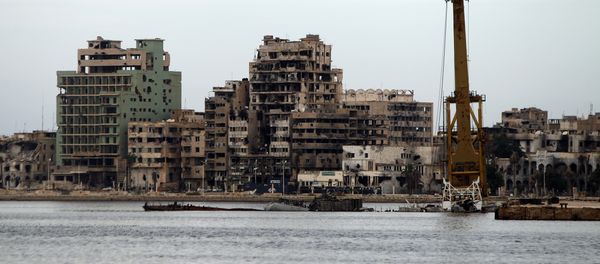 A general view shows destroyed buildings in Libya's eastern coastal city of Benghazi (file) A general view shows destroyed buildings in Libya's eastern coastal city of Benghazi (file) - Sputnik International