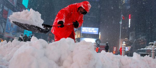 A worker clears snow in Times Square as snow falls in Manhattan, New York, U.S. A worker clears snow in Times Square as snow falls in Manhattan, New York, U.S. - Sputnik International