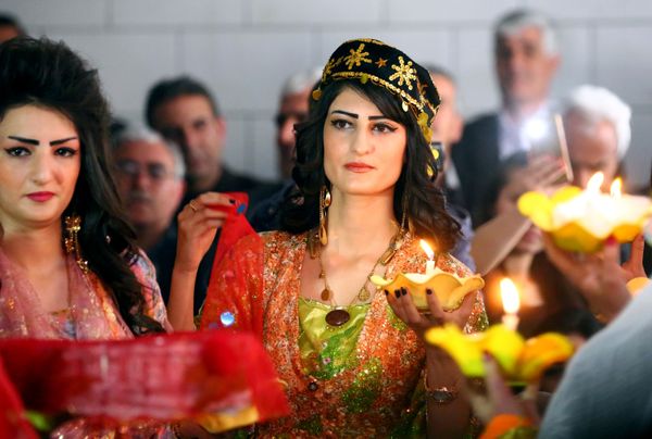 Syrian-Kurdish women present traditional Kurdish attire during a fashion show in the northeastern Syrian city of Qamishli on March 10, 2017, which coincides with the Day of Kurdish Clothing. Syrian-Kurdish women present traditional Kurdish attire during a fashion show in the northeastern Syrian city of Qamishli on March 10, 2017, which coincides with the Day of Kurdish Clothing. - Sputnik International