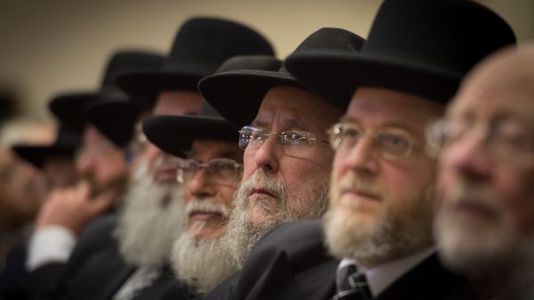 Rabbis and members of the Orthodox Jewish community attend the Installation of Chief Rabbi Ephraim Mirvis as the 11th Chief Rabbi of the United Hebrew Congregations of the UK and the Commonwealth during a ceremony at the St John's Wood Synagogue in north London on Spetember 1, 2013. - Sputnik International