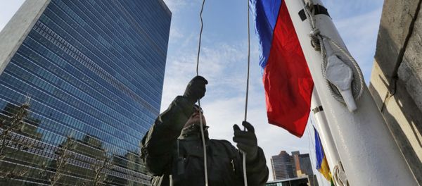 A United Nations security officer raises the Russian flag outside U.N. headquarters, Tuesday morning, Feb. 21, 2017 A United Nations security officer raises the Russian flag outside U.N. headquarters, Tuesday morning, Feb. 21, 2017 - Sputnik International