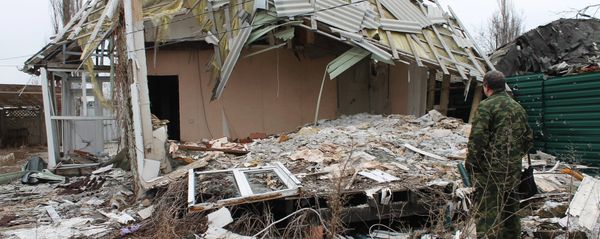 A damaged building in the village of Spartak in the Donetsk Region, affected by shelling A damaged building in the village of Spartak in the Donetsk Region, affected by shelling - Sputnik International