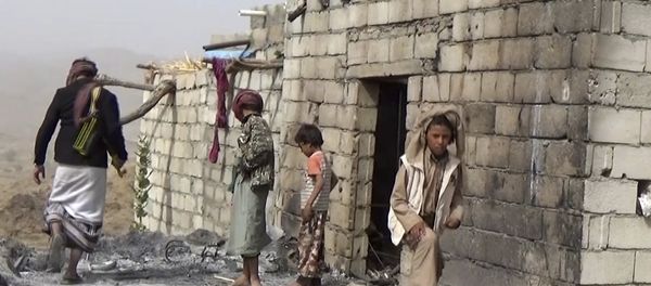In this February 3, 2017 frame grab from video, residents inspect a house that was damaged during a January 29, 2017 US raid on the tiny village of Yakla, in central Yemen. In this February 3, 2017 frame grab from video, residents inspect a house that was damaged during a January 29, 2017 US raid on the tiny village of Yakla, in central Yemen. - Sputnik International