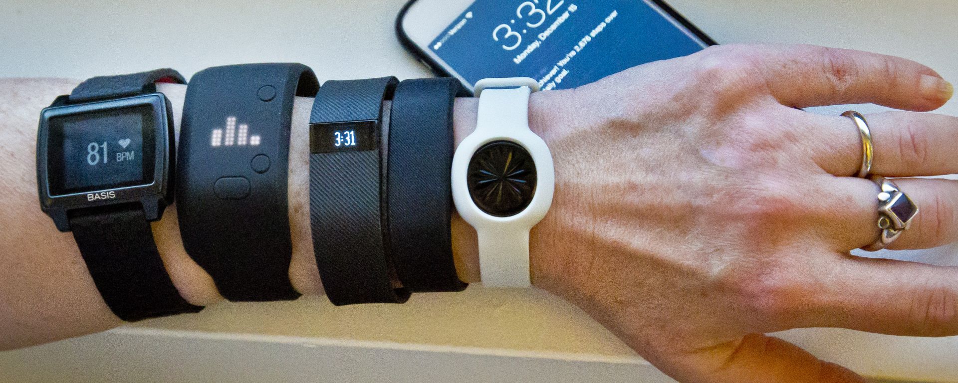 Fitness trackers, from left, Basis Peak, Adidas Fit Smart, Fitbit Charge, Sony SmartBand, and Jawbone Move, are posed for a photo next to an iPhone, in New York (File) Fitness trackers, from left, Basis Peak, Adidas Fit Smart, Fitbit Charge, Sony SmartBand, and Jawbone Move, are posed for a photo next to an iPhone, in New York (File) - Sputnik International, 1920, 29.01.2018