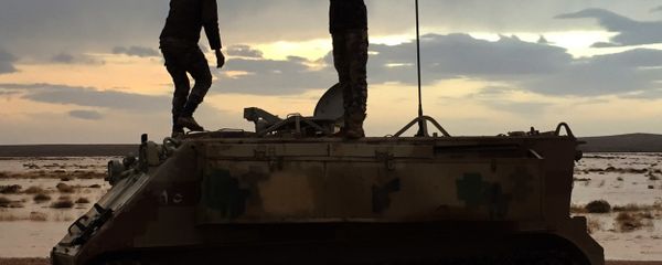 Jordanian soldiers take a break on their armored vehicle (File) - Sputnik International