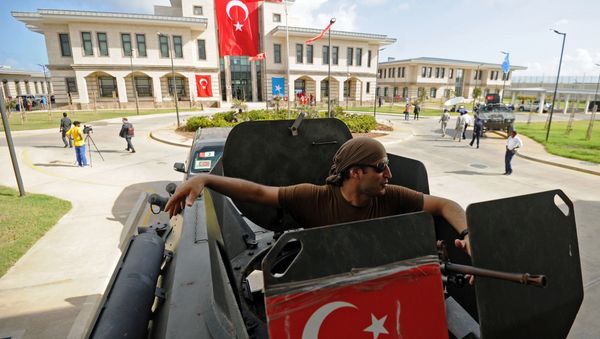 A member of the Turkish security forces sits inside an armored vehicle outside the newly opened Turkish embassy in Mogadishu on June 3, 2016 A member of the Turkish security forces sits inside an armored vehicle outside the newly opened Turkish embassy in Mogadishu on June 3, 2016 - Sputnik International