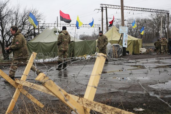(File) Ukrainian nationalist protesters and military veterans take part in a blockade against ongoing trade with the Donbass self-proclaimed republics, on February 23, 2017, in Kryvyi Torets railway station, Donetsk region (File) Ukrainian nationalist protesters and military veterans take part in a blockade against ongoing trade with the Donbass self-proclaimed republics, on February 23, 2017, in Kryvyi Torets railway station, Donetsk region - Sputnik International