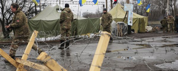 (File) Ukrainian nationalist protesters and military veterans take part in a blockade against ongoing trade with the Donbass self-proclaimed republics, on February 23, 2017, in Kryvyi Torets railway station, Donetsk region - Sputnik International