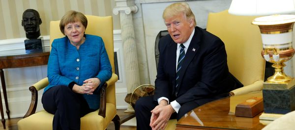 U.S. President Donald Trump and Germany's Chancellor Angela Merkel watch as reporters enter the room before their meeting in the Oval Office at the White House in Washington, U.S. March 17, 2017 U.S. President Donald Trump and Germany's Chancellor Angela Merkel watch as reporters enter the room before their meeting in the Oval Office at the White House in Washington, U.S. March 17, 2017 - Sputnik International