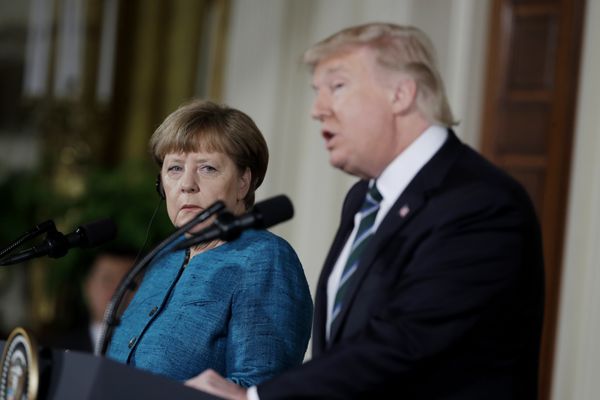 German Chancellor Angela Merkel listens as President Donald Trump speaks during their joint news conference in the East Room of the White House in Washington, Friday, March 17, 2017 - Sputnik International