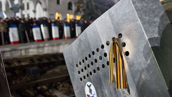 A prop shield of an extra on the set of Alexei Pimanov's film Crimea at the train station in Simferopol - Sputnik International