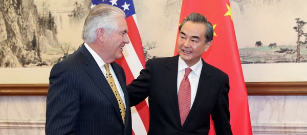 Chinese Foreign Minister Wang Yi (R) talks with U.S. Secretary of State Rex Tillerson at Diaoyutai State Guesthouse on March 18, 2017 in Beijing, China Chinese Foreign Minister Wang Yi (R) talks with U.S. Secretary of State Rex Tillerson at Diaoyutai State Guesthouse on March 18, 2017 in Beijing, China - Sputnik International
