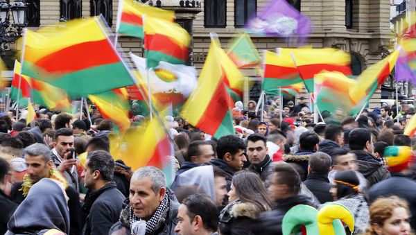 Thousands of Kurds celebrate the Newroz spring festival and protest against Turkish President Erdogan. - Sputnik International