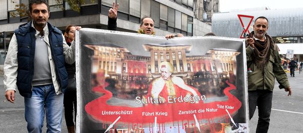 People attend a pro-Kurdish demonstration in Cologne, western Germany, on November 5, 2016 as part of an international day in support to Kurds People attend a pro-Kurdish demonstration in Cologne, western Germany, on November 5, 2016 as part of an international day in support to Kurds - Sputnik International