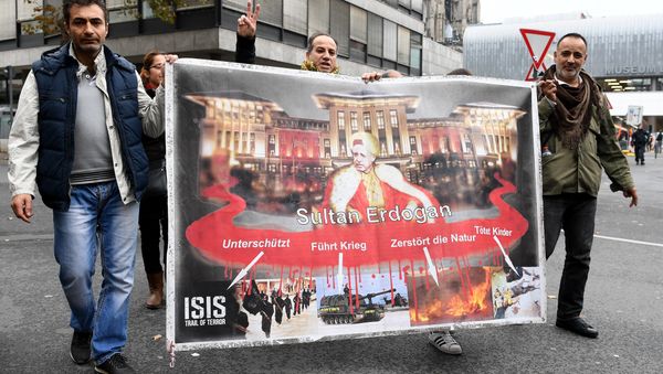 People attend a pro-Kurdish demonstration in Cologne, western Germany, on November 5, 2016 as part of an international day in support to Kurds People attend a pro-Kurdish demonstration in Cologne, western Germany, on November 5, 2016 as part of an international day in support to Kurds - Sputnik International