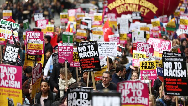 Protestors take part in a demonstration against racism in London, Britain, March 18, 2017 Protestors take part in a demonstration against racism in London, Britain, March 18, 2017 - Sputnik International