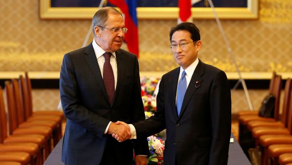 Russian Foreign Minister Sergei Lavrov (L) shakes hands with Japanese Foreign Minister Fumio Kishida at the start of their meeting as a part of Japan-Russia foreign and defence ministers meeting called two-plus-two at Iikura guest house in Tokyo, Japan March 20, 2017. Russian Foreign Minister Sergei Lavrov (L) shakes hands with Japanese Foreign Minister Fumio Kishida at the start of their meeting as a part of Japan-Russia foreign and defence ministers meeting called two-plus-two at Iikura guest house in Tokyo, Japan March 20, 2017. - Sputnik International