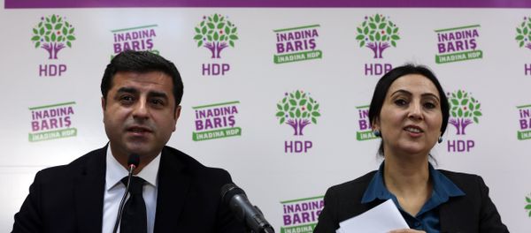 Co-chairmen of pro-Kurdish People's Democratic Party, or HDP, Selahattin Demirtas, left, and Figen Yuksekdag speak to the media in Ankara, Turkey, Sunday, Nov. 1, 2015. Turkey’s ruling Justice and Development Party appeared to sweep back into single-party rule after a stunning victory in Sunday’s parliamentary election. Co-chairmen of pro-Kurdish People's Democratic Party, or HDP, Selahattin Demirtas, left, and Figen Yuksekdag speak to the media in Ankara, Turkey, Sunday, Nov. 1, 2015. Turkey’s ruling Justice and Development Party appeared to sweep back into single-party rule after a stunning victory in Sunday’s parliamentary election. - Sputnik International