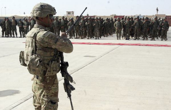 In this July 24, 2016 file photo, a US military personal stands guard during a graduation ceremony for Afghan troops, in Lashkargah, capital of southern Helmand province, Afghanistan. In this July 24, 2016 file photo, a US military personal stands guard during a graduation ceremony for Afghan troops, in Lashkargah, capital of southern Helmand province, Afghanistan. - Sputnik International