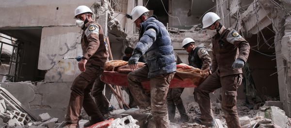 Syrian civil defence volunteers, known as the White Helmets, search for survivors following reported government airstrike on the rebel-held neighbourhood of Tishrin, on the northeastern outskirts of the capital Damascus Syrian civil defence volunteers, known as the White Helmets, search for survivors following reported government airstrike on the rebel-held neighbourhood of Tishrin, on the northeastern outskirts of the capital Damascus - Sputnik International