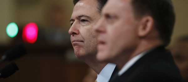 FBI Director James Comey, left, joined by National Security Agency Director Michael Rogers, right, testifies on Capitol Hill in Washington, Monday, March 20, 2017, before the House Intelligence Committee hearing on allegations of Russian interference in the 2016 U.S. presidential election FBI Director James Comey, left, joined by National Security Agency Director Michael Rogers, right, testifies on Capitol Hill in Washington, Monday, March 20, 2017, before the House Intelligence Committee hearing on allegations of Russian interference in the 2016 U.S. presidential election - Sputnik International