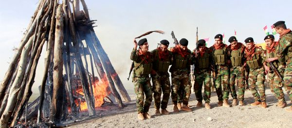 Kurdish Peshmerga forces celebrate Newroz Day, a festival marking spring and the new year, in Kirkuk March 20, 2017. Kurdish Peshmerga forces celebrate Newroz Day, a festival marking spring and the new year, in Kirkuk March 20, 2017. - Sputnik International
