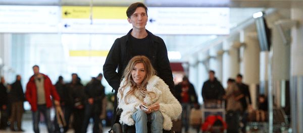 Singer Yulia Samoilova, Russia's Eurovision 2017 contestant, and her husband, Alexei Taran, at Sheremetyevo Airport Singer Yulia Samoilova, Russia's Eurovision 2017 contestant, and her husband, Alexei Taran, at Sheremetyevo Airport - Sputnik International