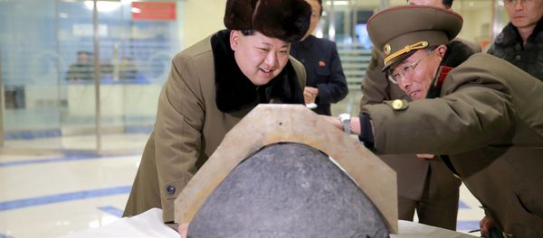 North Korean leader Kim Jong Un looks at a rocket warhead tip after a simulated test of atmospheric re-entry of a ballistic missile, at an unidentified location in this undated file photo released by North Korea's Korean Central News Agency (KCNA) in Pyongyang on March 15, 2016. North Korean leader Kim Jong Un looks at a rocket warhead tip after a simulated test of atmospheric re-entry of a ballistic missile, at an unidentified location in this undated file photo released by North Korea's Korean Central News Agency (KCNA) in Pyongyang on March 15, 2016. - Sputnik International