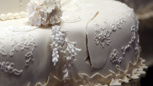 The royal wedding cake, showing the first cut made by the Duke and Duchess of Cambridge, is seen in Buckingham Palace, London, Wednesday July 20, 2011, before going on display to the public during the palace's annual summer opening. - Sputnik International